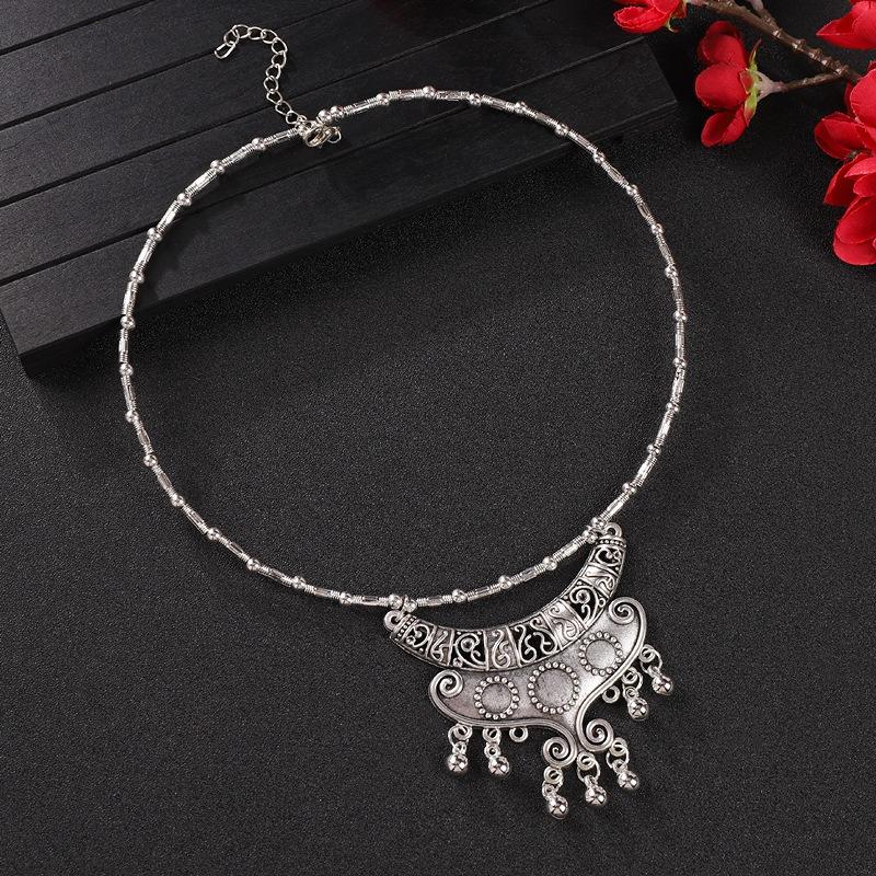 Vintage tassel collar hollow flower seedling silver pendant necklace niche personality collarbone chain women