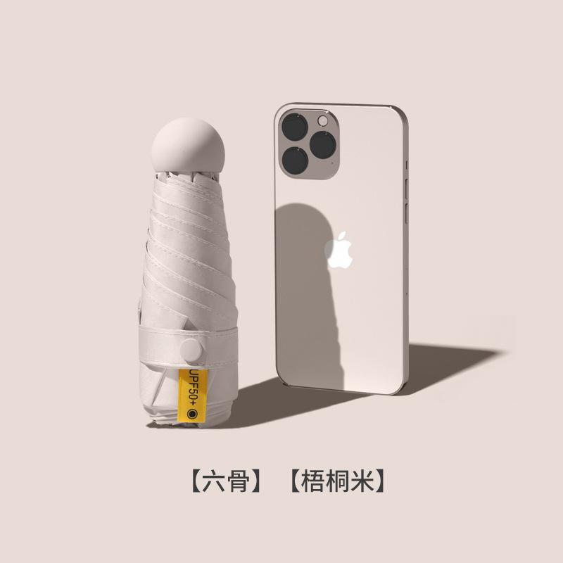 

Easy Storage Magic Strap Card Mini Sunscreen Upf Uv Protection Capsule Rain And Shine Umbrella Free Folding Umbrella