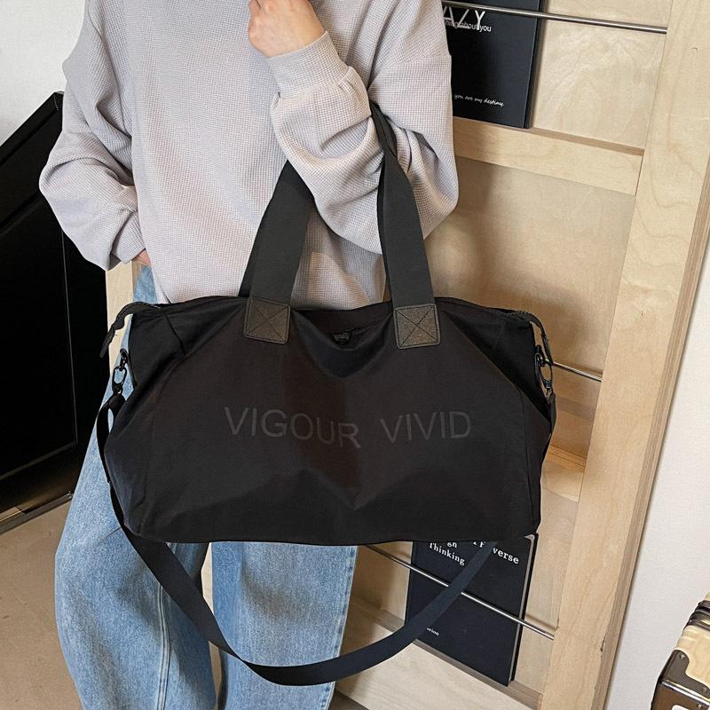 Business trip short trip bag women's lightweight solid color fitness bag fashion shoulder sports bag men's portable storage duffel bag