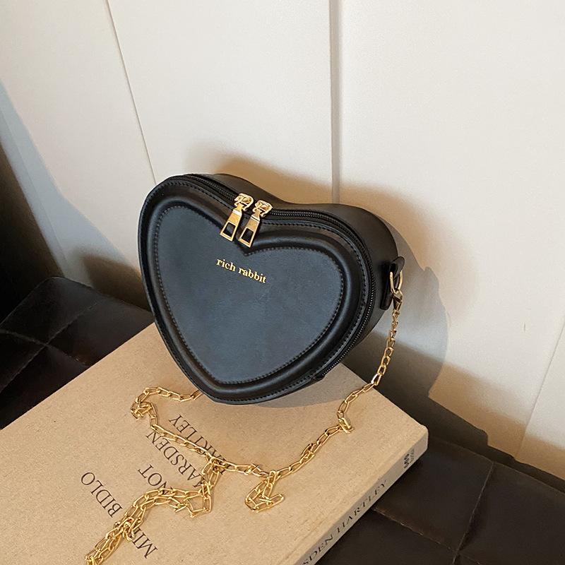 

Женская сумка в форме сердца с углублениями, модный тренд лета 2024 года, милая любовь, модная личность, милая сумка-мессенджер через плечо чёрный
