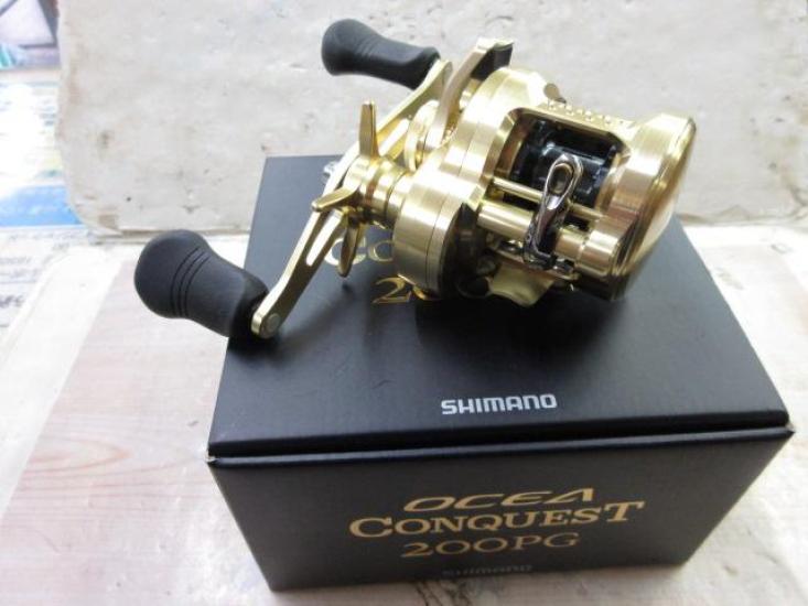 

Shimano 23 Ocea Conquest 200PG – Премиальная морская мультипликаторная катушка, силовая передача золотой