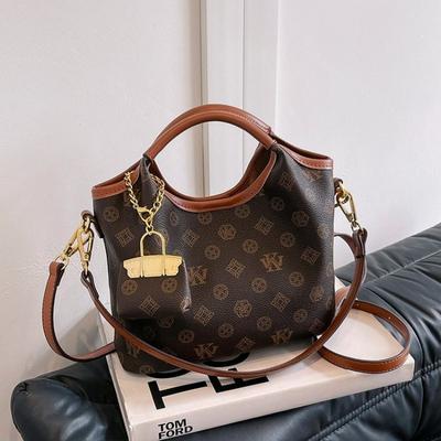 Xingang Style Old Flower Handtasche 2024 Neue Eimertasche mit großer Kapazität Damenhandtasche Eine Schulter Damentasche Umhängetasche