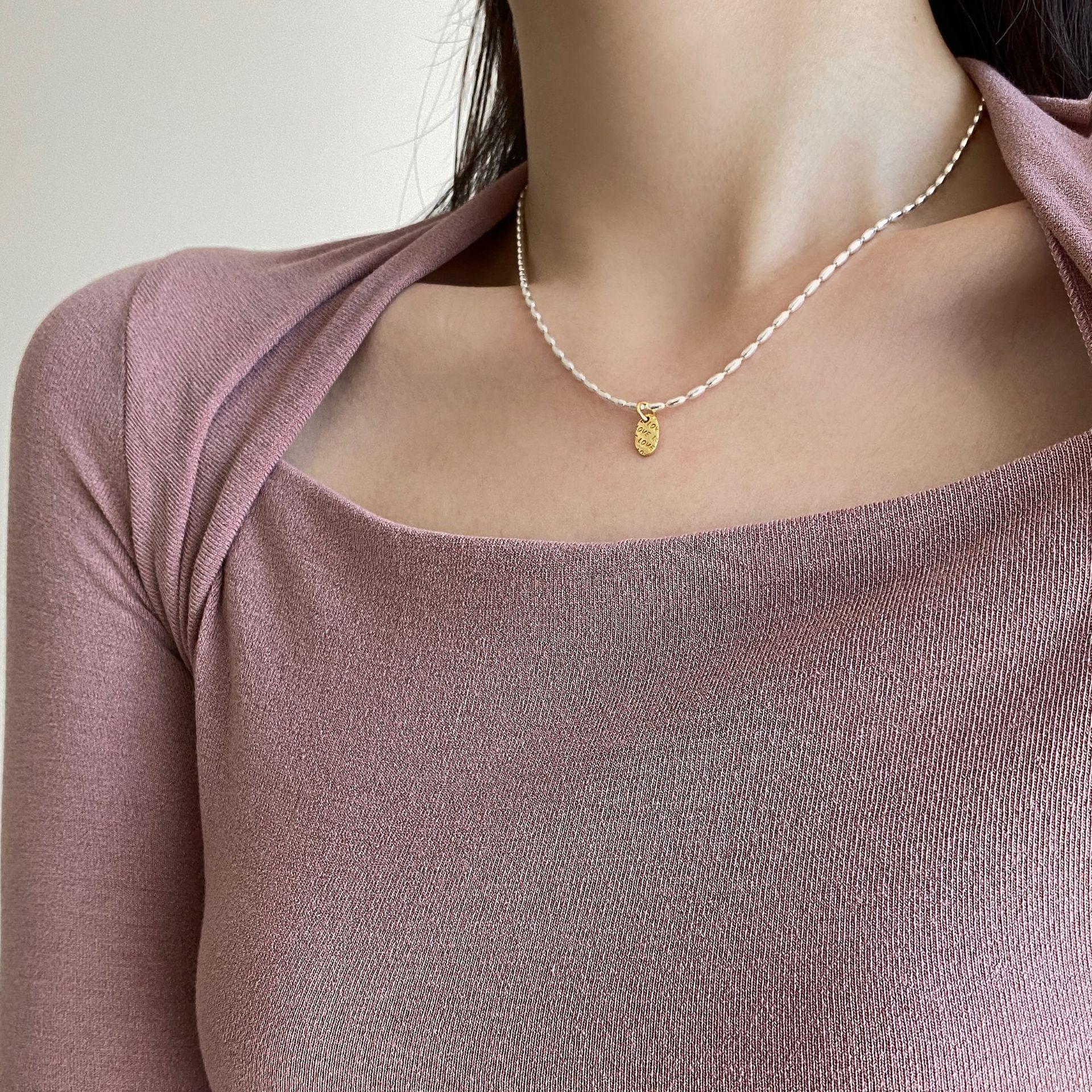 

Personality Sense Alphabet Oval Gold Pendant Olive Bead Rice Necklace With Accessories