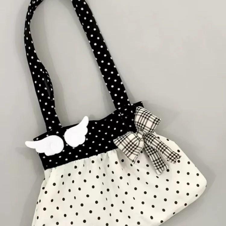 Niche design black and white polka dot canvas bag women's lazy style ancient commuting shoulder bag bow handbag