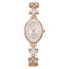 Luxury Rhinestone Women's Wristwatch with Round Dial and Colored Diamond Bracelet.