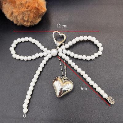 Porte-clés pendentif en argent avec nœud en perles et nœud coréen chic avec fixation pour AirPods pour téléphone portable