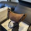 Vintage Aesthetic Horn Bag For Women With Soft Suede Material And Unique Design