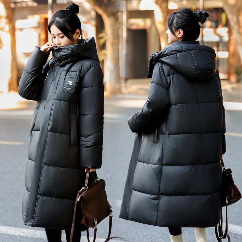 

Женское пуховое пальто, длинная зимняя одежда 2025, новый стиль, корейское свободное пальто оверсайз до колена, толстое, большого размера XXL чёрный