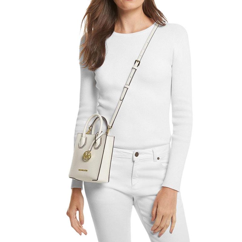 MICHAEL KORS Mercer gold metal charm adjustable shoulder strap cowhide handbag mini women's light cream