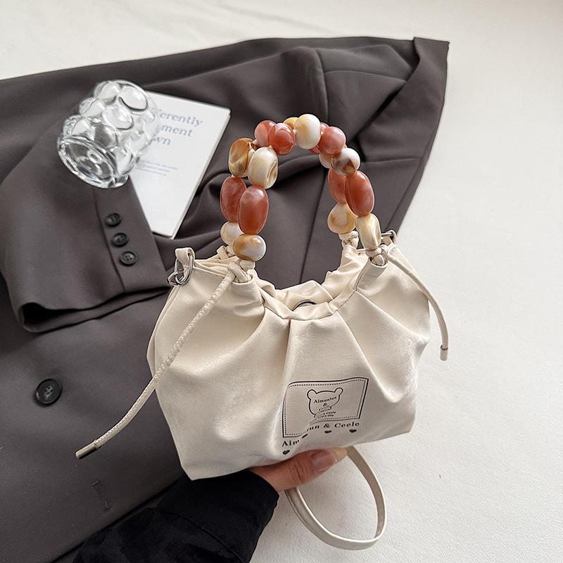 Gefaltete Sommer neue vielseitige Perlenhandtasche Mode lässiger Trend hohes Temperament Schulter Messenger Bag