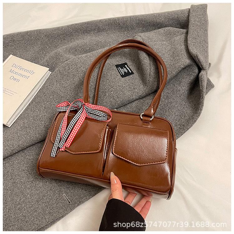 Korean Internet celebrities with the same bowling bag 2025 new niche Boston shoulder bow portable underarm women's bag