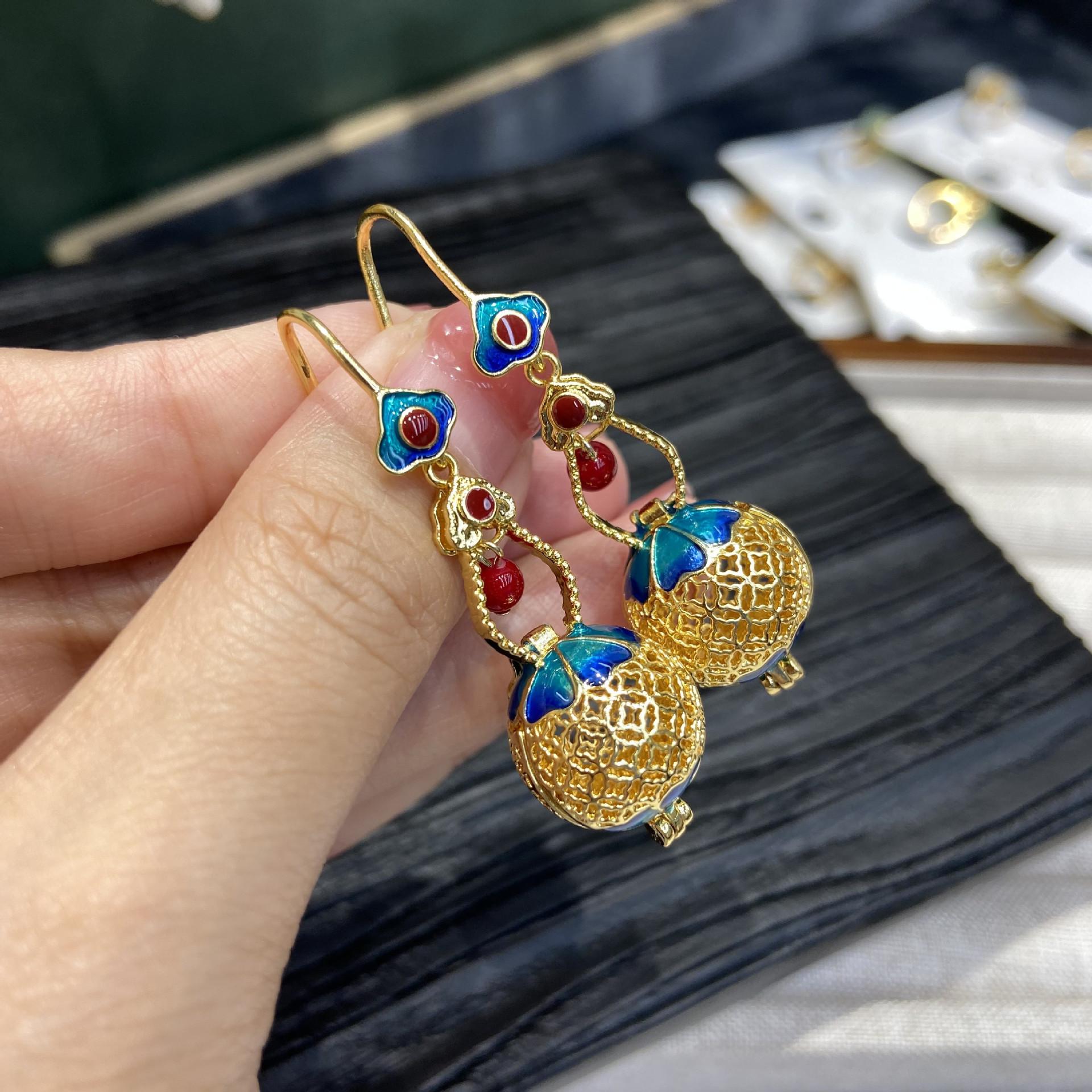 

Медное гальваническое покрытие из настоящего золота 18 карат, новые китайские эмалевые серьги с благоприятным узором, полые сферические серьги источник