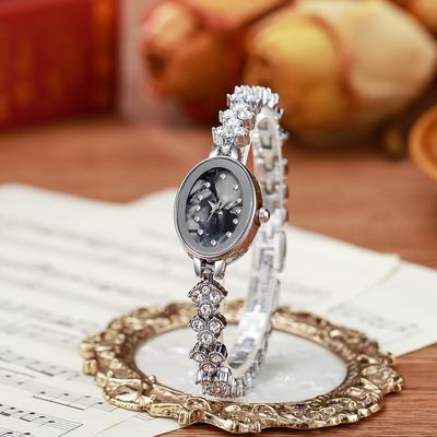 Ladies' Exquisite and Fashionable Diamond Dot Scale Oval Dial Full Diamond Steel Strip Quartz Watch, Suitable for Daily Wear, Bi