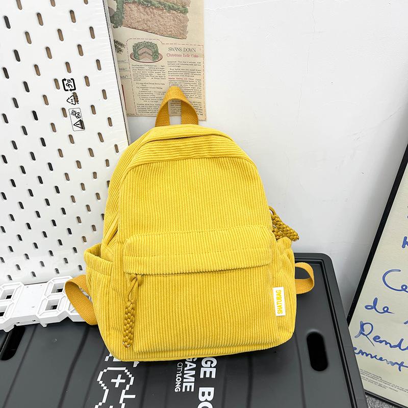 

Corduroy small backpack women s fashion spring new Japanese ins simple and versatile travel shopping soft girl backpack жёлтый