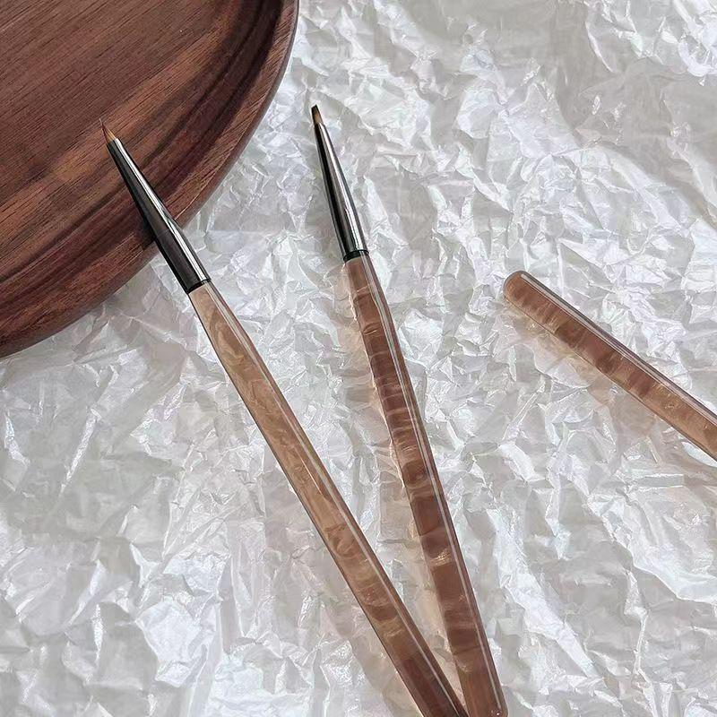 

Nail Art Triangle Pen: Create Butterflies, Petals & Leaves with Gel Embossing for Salons