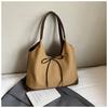 Retro commuter niche bow single shoulder armpit bag 2025 Korean version new fashion simple contrasting color tote bag