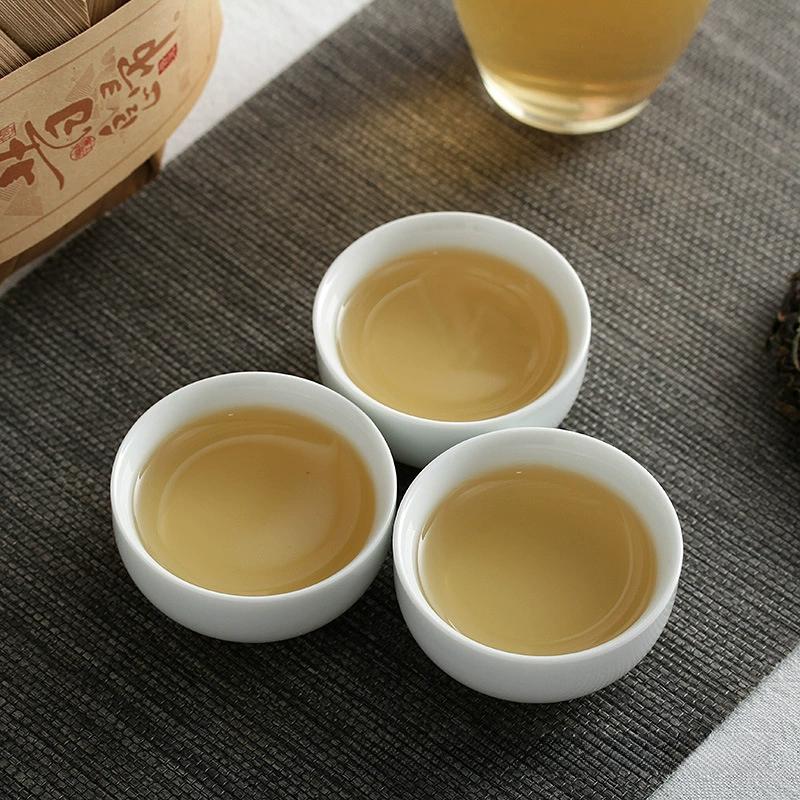 Premium Yunnan Pu'er Tea Ancient Tree Xiaosheng Tea Cake 100g