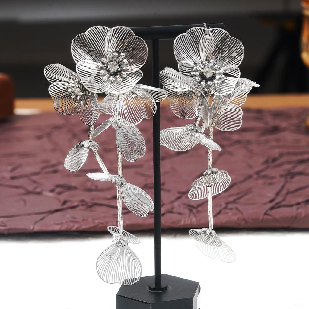Silver Rhinestone Fishtail Tassel Earrings: Exaggerated Flower Design for a Stylish Look.