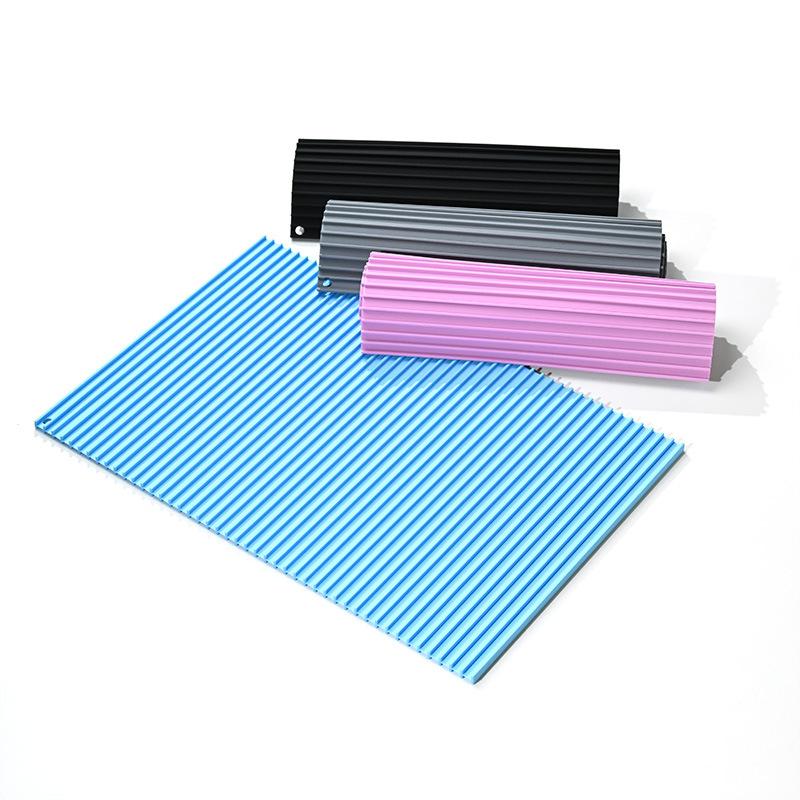 

New silicone diversion type double-sided roller shutter drain mat high temperature resistance and heat insulation household tableware table mat