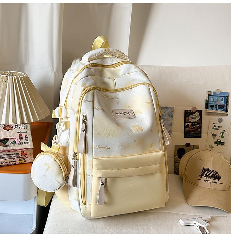 Cartable grande valeur petit frais doux fille sac à dos mignon dessin animé sac à dos grande capacité collège étudiant sac d'école