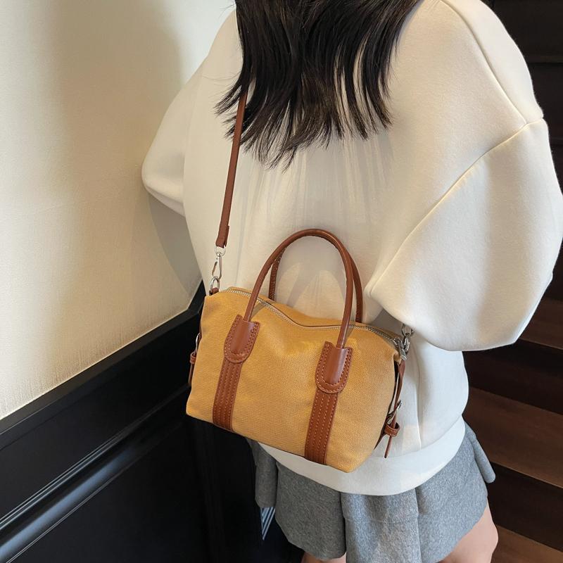 Classic Canvas Duffel Bag with Leather Trim and Adjustable Strap Perfect for Travel and Everyday Use