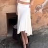Elegant French White Irregular Half Skirt with Flowing Drape, Side Tie, and Low Waist Design