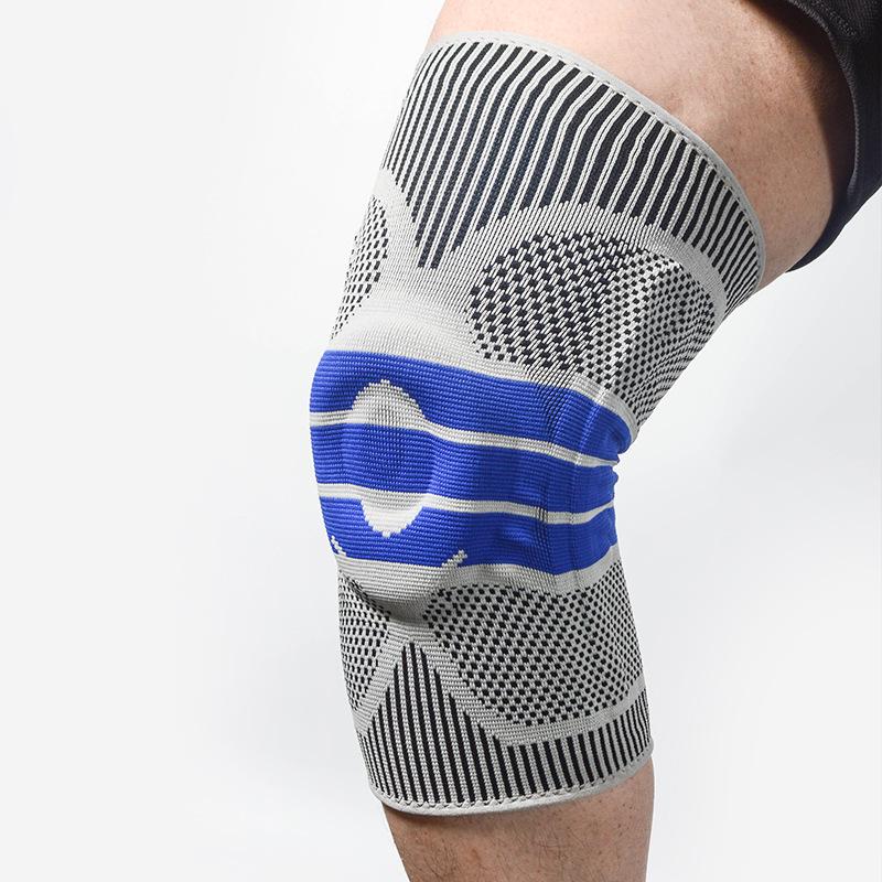 

Sports Knee Brace with Silicone Spring Boost for Anti-collision Protection in Basketball, Football, Badminton, and Table Tennis. Gray Blue M