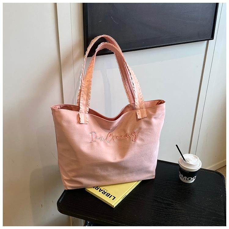 

Canvas large bag female new student hand-held canvas bag versatile support bag shoulder bag tide розовый