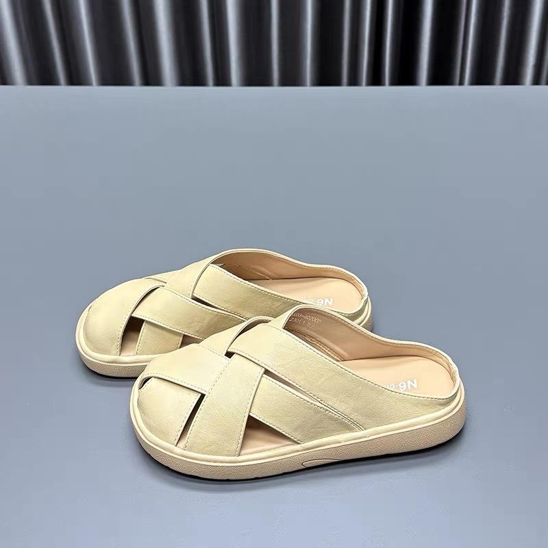 Woven French bag head slippers women's 2025 summer new flat bottom hollow fashion high sense with skirt cool slippers