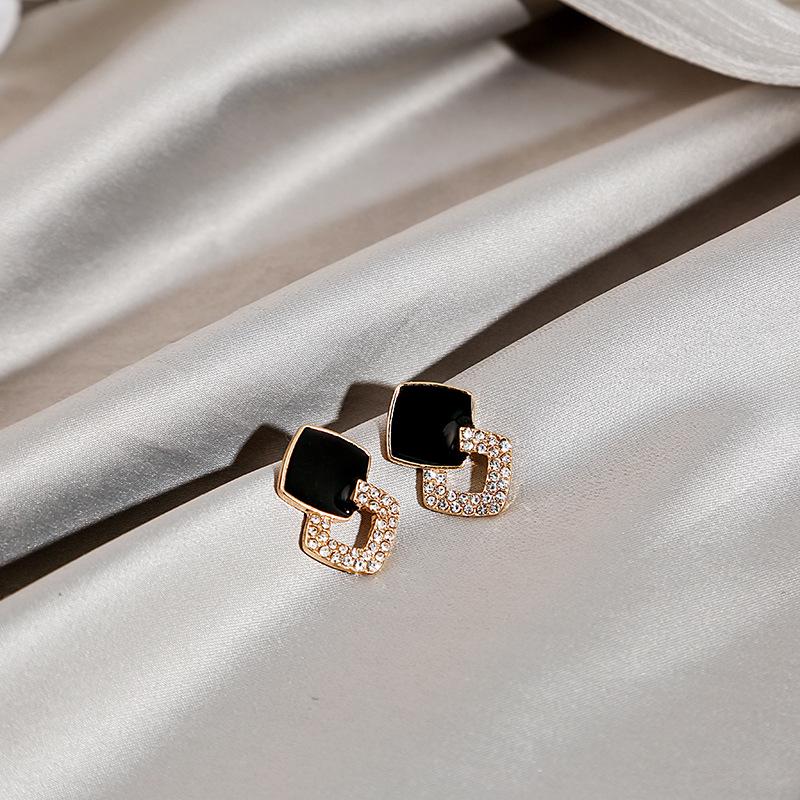Silver Needle Inlaid Diamond Tassel Earrings with Pearl Butterfly Design