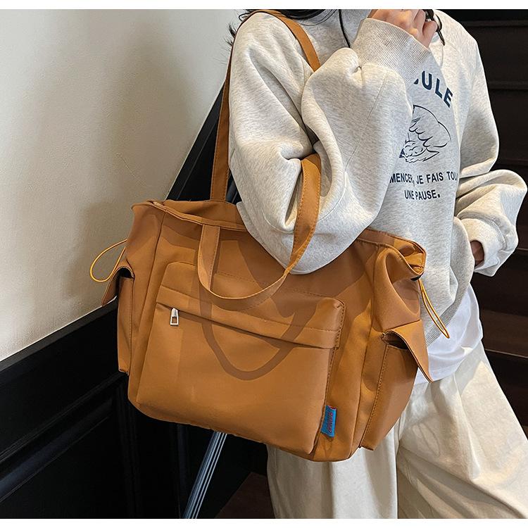 Retro Unterarmtasche Damen neue modische Canvas-Tasche mit großem Fassungsvermögen Umhängetasche vielseitige Pendler-Tragetasche