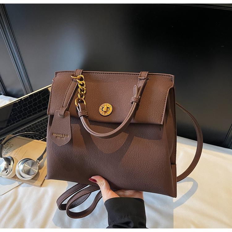 

Retro large-capacity backpack women s 2025 new casual portable Korean version schoolbag popular fashion shoulder bag backpack темно-коричневого кольору