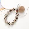 Kurze Handgemachte Wollblume Liebes Tasche Perlen Anhänger Internet Berühmtheit Handy Lanyard Tragbare Kette Lanyard