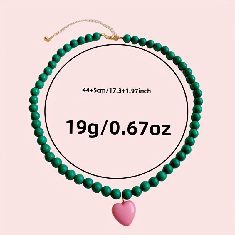 A Trendy New Colorful Bead Necklace Featuring a Unique Heart-Shaped Pendant, Perfect for Women Who Love Fashionable Handmade