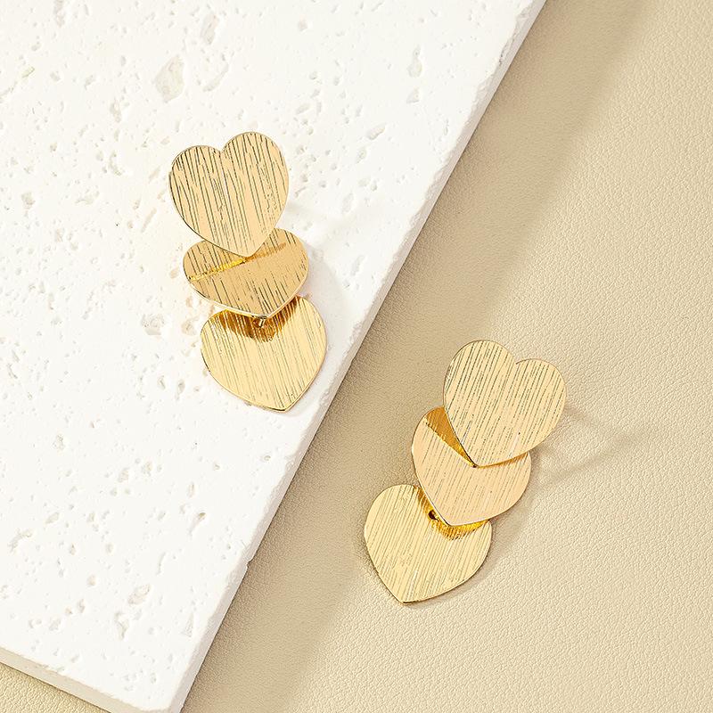 Exaggerated Punk Heart Earrings: European & American Style for Women