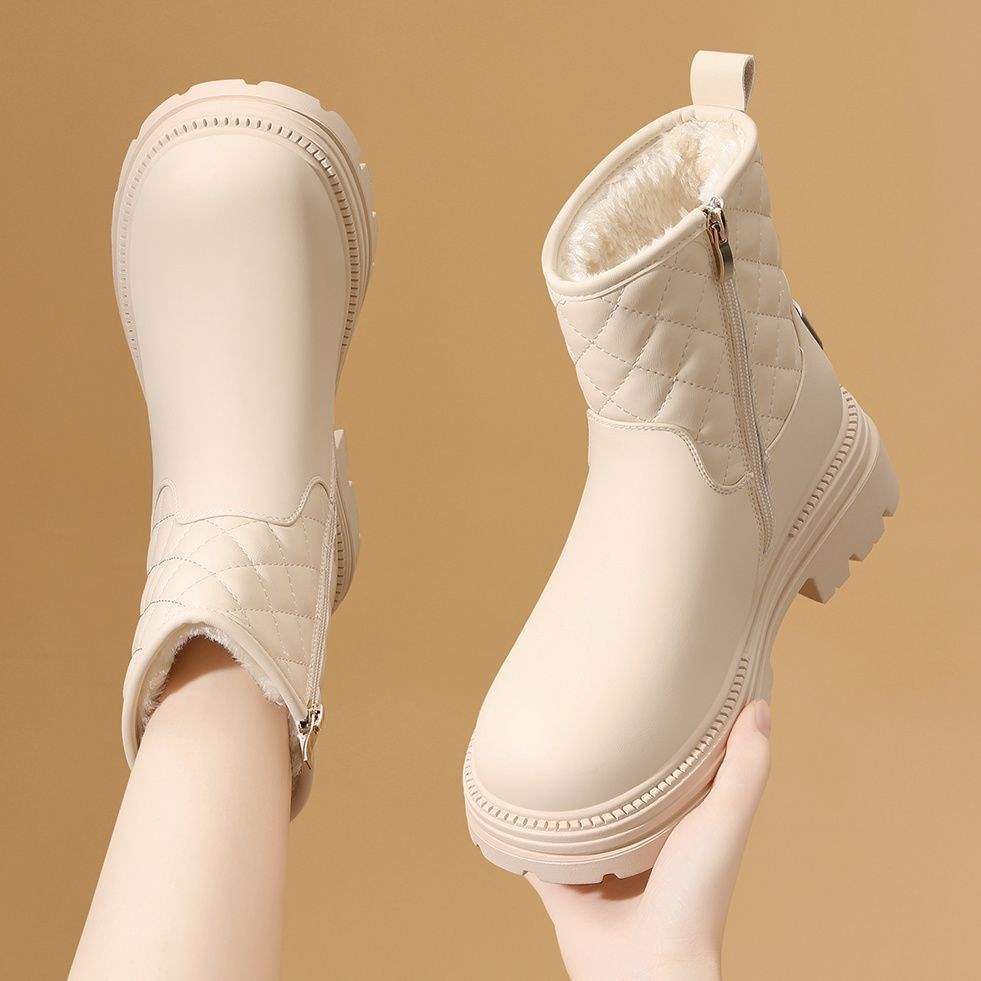 

Snow boots women s 2025 new winter velvet thickened bottom waterproof non-slip leather Martin boots Northeast cold-resistant boots 99