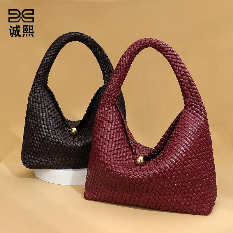 Fashion new small golden ball hand-woven women's bag texture trend niche single shoulder armpit bag large capacity hand bag