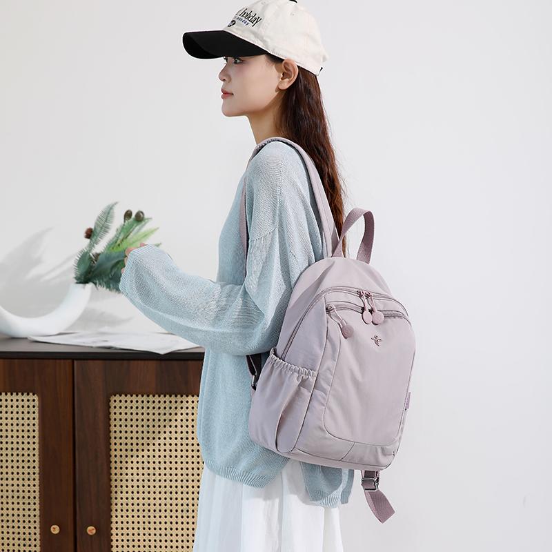 Leichter Nylon-Rucksack mit Reißverschlusstasche vorne Seitentaschen Verstellbare Träger Lässiger Tagesrucksack für Damen für den täglichen Gebrauch und Reisen