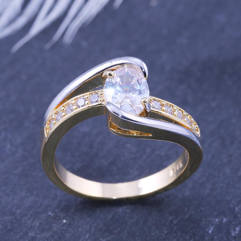 Modeschmuck, Zweifarbig galvanisierter Zirkon Verlobungsring in Gänseeiform.