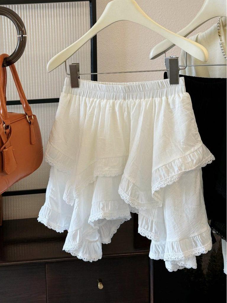 2026 New Irregular White Lace Trim Patchwork Cake Skirt: High Waist, Fluffy, Short Women's Skirt