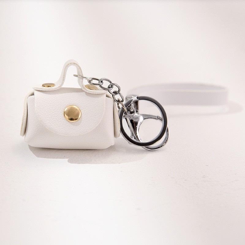PU Leather Bracelet Coin Purse Keychain: Cute Mini Bag for Earphones & Data Cables