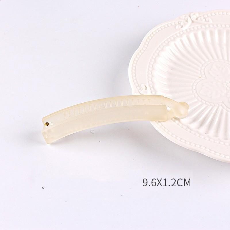 Neue Farbe Pan Haar Banane Clip Licht Luxus Stein High-End-Mode Pferdeschwanz Clip Haarschmuck Haarnadel