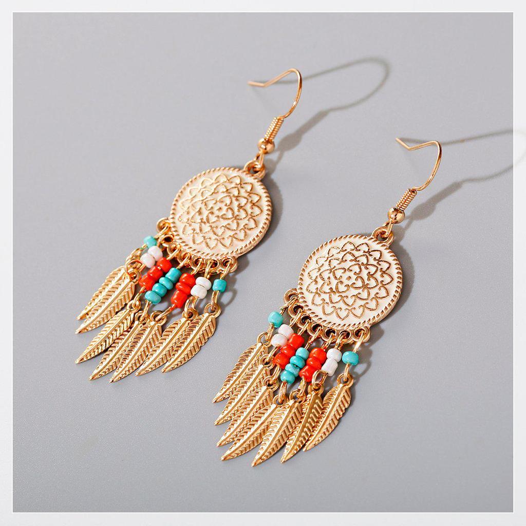 Yunnan Ethnic Bohemian Feather Earrings - Exaggerated No-Pierce Clips for Women
