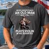 Never Underestimate An Old Man Who Plays Guitar Who Still Plays Guitar In His Seventies T-Shirt, Guitar Gifts for Men, 70s Shirts Birthday