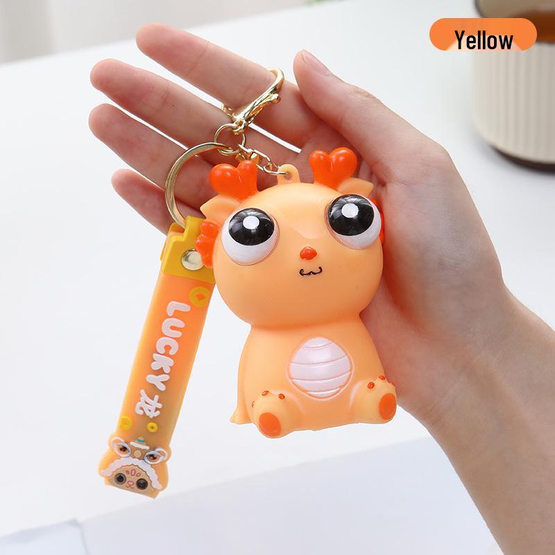 Exploding Eye Dragon Keychain: Squishy Stress Relief Toy and Pendant