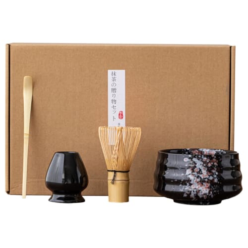 This 4-piece tea ceremony set includes a tea whisk, a 100-piece tea whisk holder, a straightening tool, a tea scoop, and a matcha bowl. It's compact a