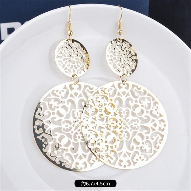 Fashion exaggerated niche temperament fringed earrings retro personality versatile sequined earrings women's long ear jewelry
