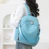Sac à dos simple couleur unie pour femme grande capacité urbain polyvalent sac de travail texture PU fonctionnel sac à bandoulière décontracté