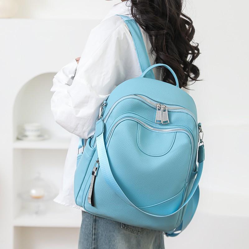 Sac à dos simple couleur unie pour femme grande capacité urbain polyvalent sac de travail texture PU fonctionnel sac à bandoulière décontracté