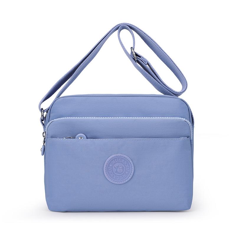 

Сумка через плечо для мамы среднего возраста Легкая многосекционная женская нейлоновая сумка Сумка кроссбоди небесно-голубой